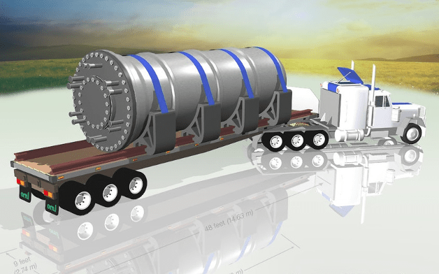Rendering przedstawiający jednostkę SMR w transporcie. Źródło: https://www.fircroft.com/blogs/jordan-agrees-to-purchase-small-modular-reactors-from-rolls-royce-82424153954